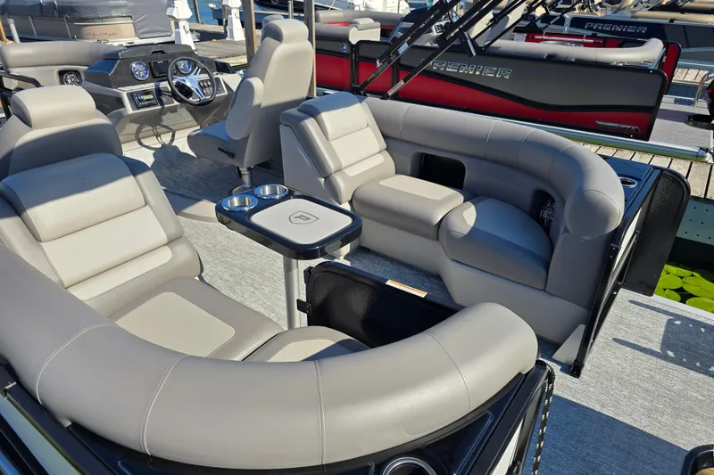 Slide: The Image of Luxurious seating on 2025 Premier 210 Sunsation RF pontoon boat, featuring modern design and comfort. - 7