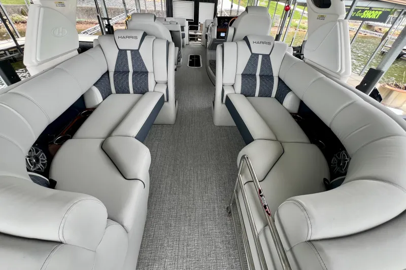 Slide: The Image of Luxurious interior of 2025 Harris Grand Mariner 250 pontoon boat with plush seating. - 27