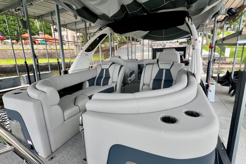 Slide: The Image of 2025 Harris Grand Mariner 250 pontoon boat with luxurious seating and modern design. - 30