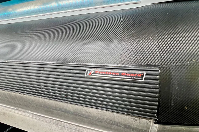 Slide: The Image of Close-up of 2025 Harris Grand Mariner 250 with Pontoon Guard protection. - 33