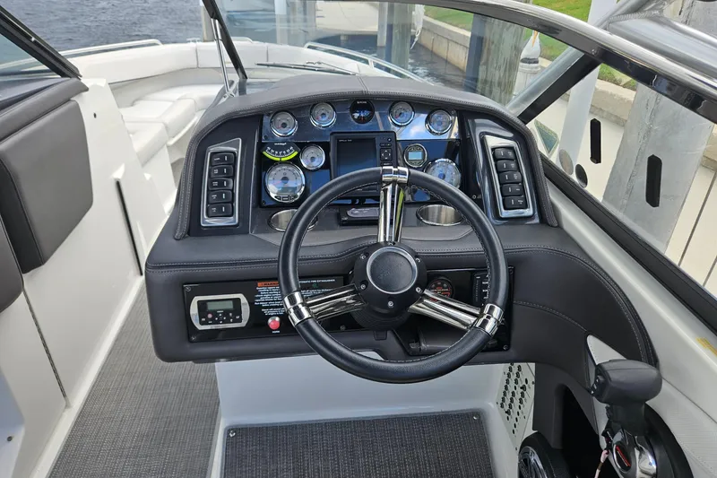 Slide: The Image of 2017 Formula 270 Bowrider dashboard with steering wheel and control panel. - 25