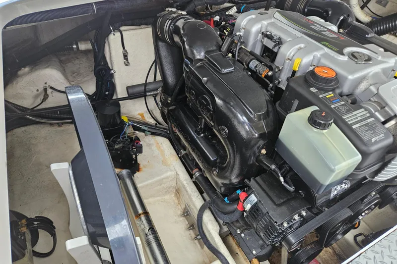 Slide: The Image of Engine compartment of a 2017 Formula 270 Bowrider boat, showcasing detailed components. - 31