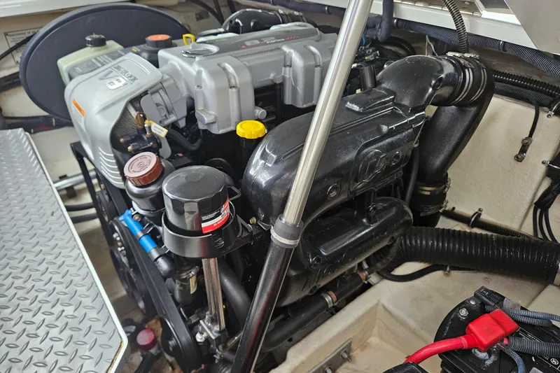 Slide: The Image of Engine compartment of a 2017 Formula 270 Bowrider boat, showcasing detailed components. - 32