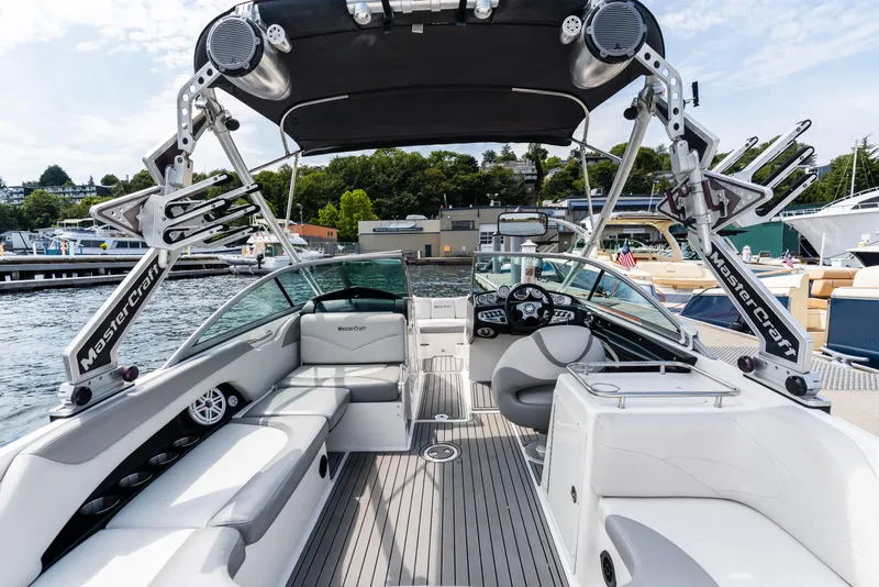 Slide: The Image of 2008 MasterCraft MariStar 235 SS boat interior with sleek seating and advanced controls. - 7