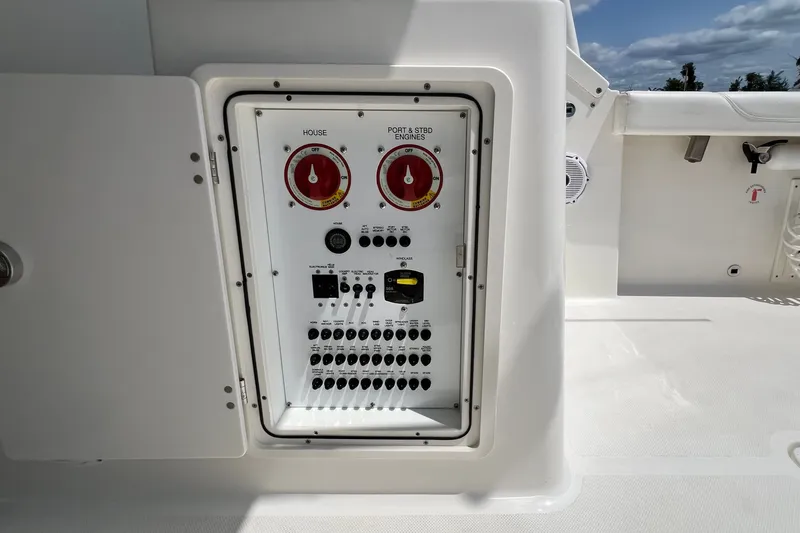 Slide: The Image of main 12V power panel/switches - 44