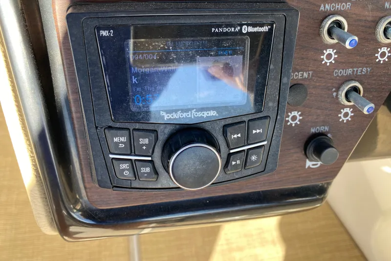Slide: The Image of Dashboard of 2018 Sea Ray SPX 230 boat with gauges and controls. - 16