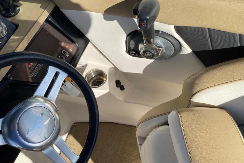 Slide: The Image of Rockford Fosgate audio system on 2018 Sea Ray SPX 230 boat dashboard. - 17