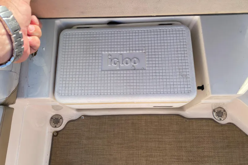 Slide: The Image of 2018 Sea Ray SPX 230 boat interior with beige and white seating. - 21