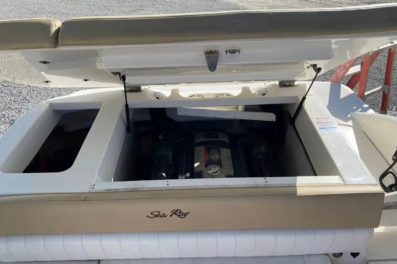 Slide: The Image of 2018 Sea Ray SPX 230 boat seat with beige and white upholstery. - 24