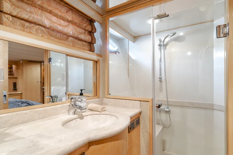 Slide: The Image of Luxurious bathroom in 2003 Ocean Alexander 64 Pilothouse yacht with shower and vanity. - 22