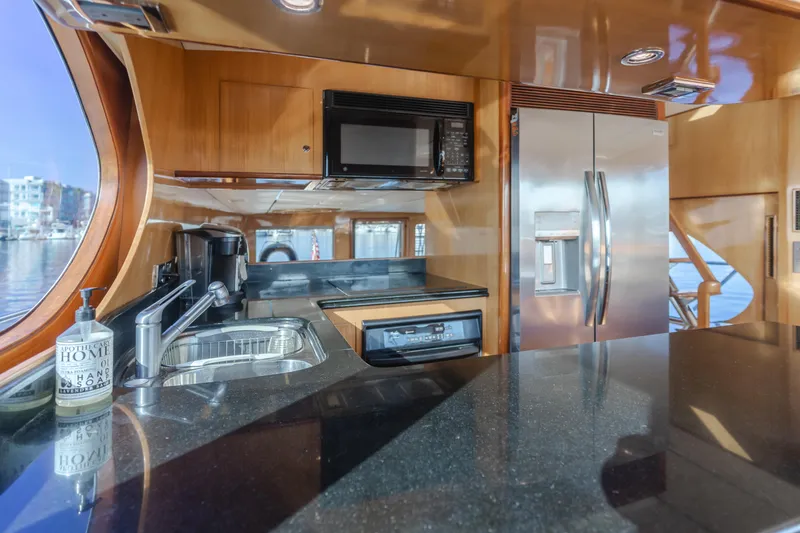 Slide: The Image of Luxurious kitchen interior of 2003 Ocean Alexander 64 Pilothouse yacht. - 42