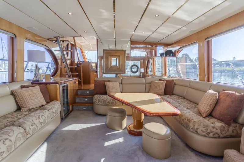 Slide: The Image of Luxurious interior of 2003 Ocean Alexander 64 Pilothouse yacht with plush seating and elegant decor. - 44