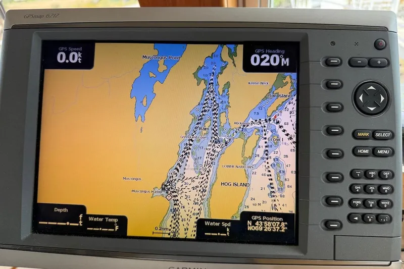 Slide: The Image of GPS navigation screen on a 1990 Nauset Flybridge Cruiser, displaying a nautical chart. - 54