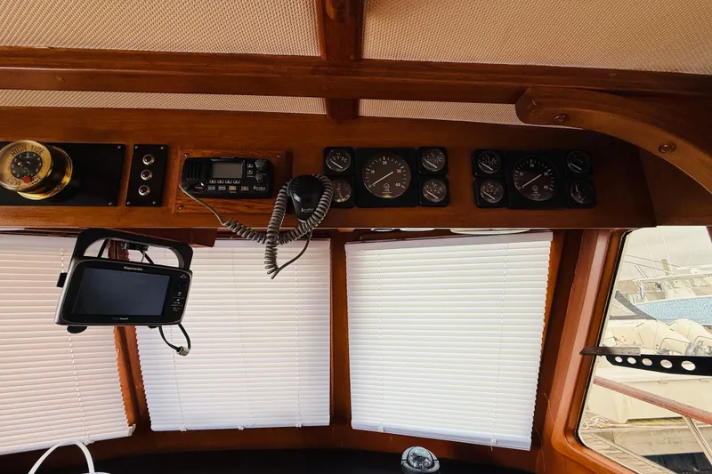 Slide: The Image of Interior dashboard of a 1984 Chien Hwa 35 Trawler with navigation instruments. - 11