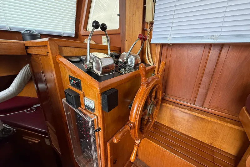 Slide: The Image of Interior helm of 1984 Chien Hwa 35 Trawler with wooden wheel and controls. - 6