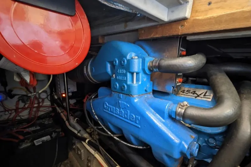 Slide: The Image of Engine compartment of a 1995 Silverton 34 Convertible boat with Crusader 454 XL engine. - 24