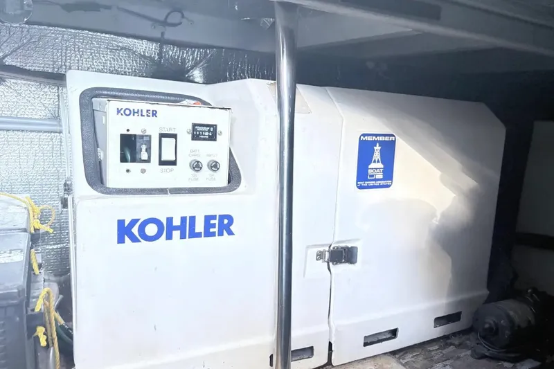 Slide: The Image of Kohler generator in 1995 Silverton 34 Convertible boat engine room. - 27