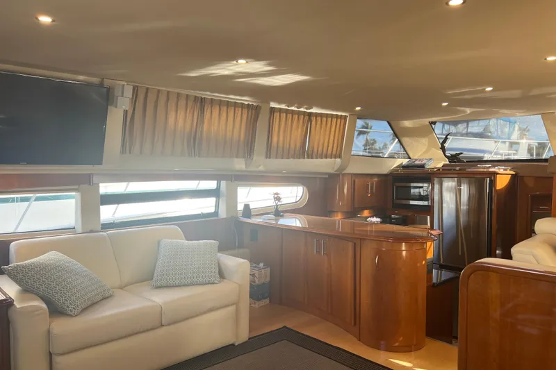 Slide: The Image of Luxurious interior of 2004 Carver 466 MY yacht with modern kitchen and comfortable seating. - 25