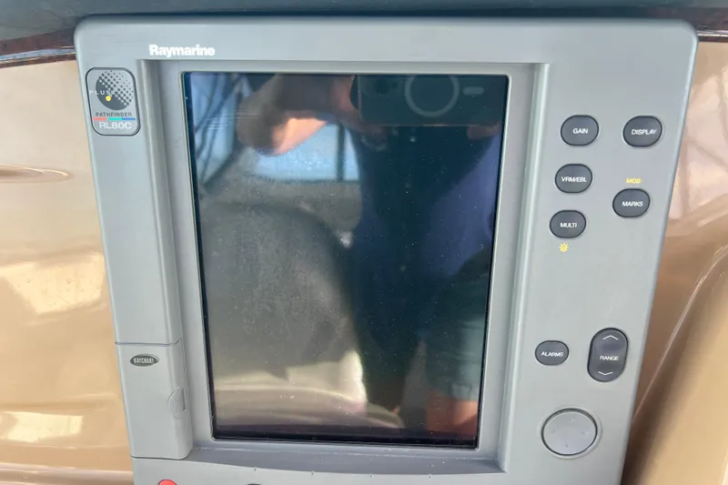 Slide: The Image of Raymarine Pathfinder RL80C display on 2004 Carver 466 MY yacht dashboard. - 11