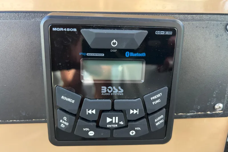 Slide: The Image of Boss Audio Systems MGR450B marine stereo with Bluetooth on 2004 Carver 466 MY. - 13