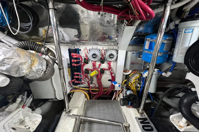 Slide: The Image of Engine room of 2004 Carver 466 Motor Yacht with wiring and equipment. - 44