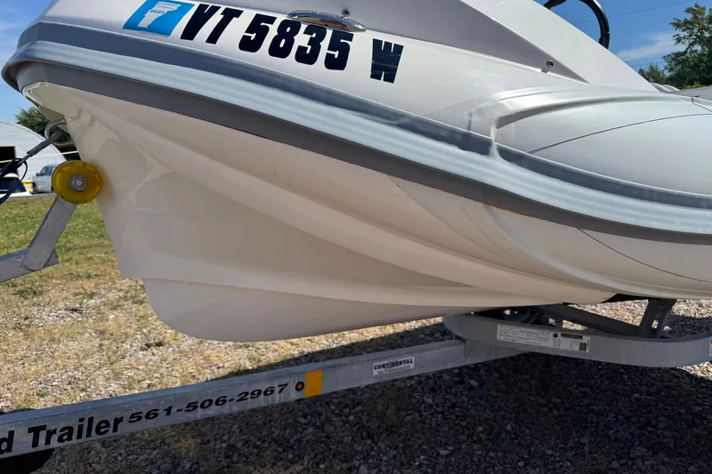 Slide: The Image of 2022 Zar Tender ZF0 boat on trailer, close-up of hull and registration number. - 17