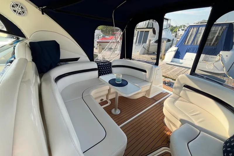 Slide: The Image of Luxurious 2006 Sea Ray 380 Sundancer yacht interior with elegant seating and wooden flooring. - 20