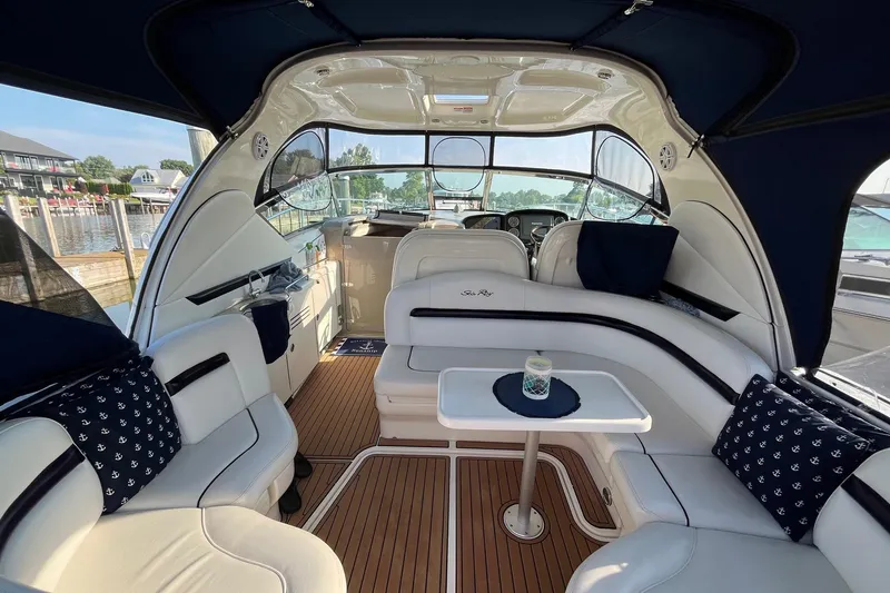 Slide: The Image of Luxurious 2006 Sea Ray 380 Sundancer interior with elegant seating and nautical decor. - 23
