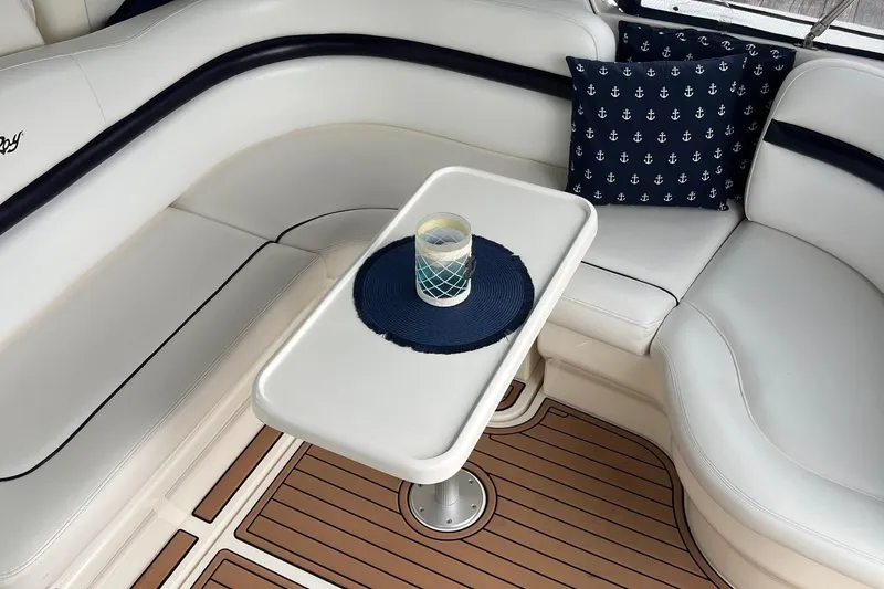 Slide: The Image of Luxurious seating area on a 2006 Sea Ray 380 Sundancer yacht with nautical decor. - 26