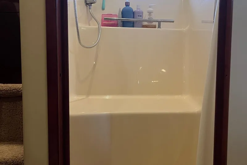 Slide: The Image of Luxurious bathroom in 2006 Sea Ray 380 Sundancer yacht with modern amenities. - 41