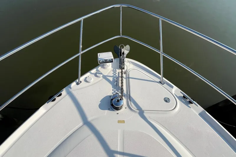 Slide: The Image of Bow of 2006 Sea Ray 380 Sundancer yacht with anchor and railing. - 8