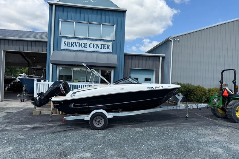 Slide: The Image of 2022 Bayliner VR4 Bowrider OB on trailer outside service center. - 0