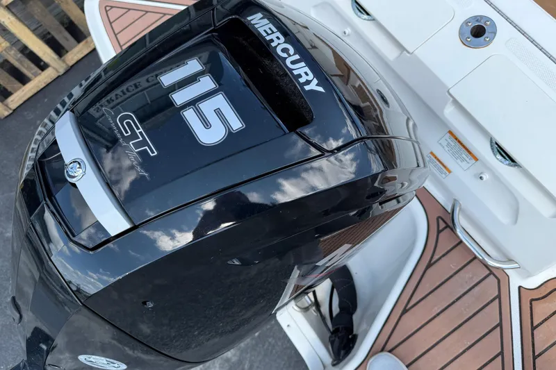 Slide: The Image of 2022 Bayliner VR4 Bowrider OB with Mercury 115 CT outboard engine, rear deck view. - 6