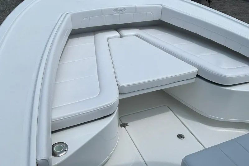 Slide: The Image of 2026 Pair Customs 21 Center Console MV boat with white cushioned seating. - 3