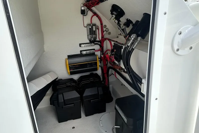 Slide: The Image of Interior view of 2026 Pair Customs 21 Center Console MV boat's electrical system. - 5