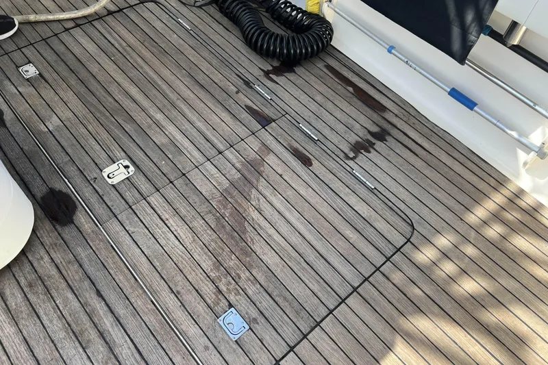 Slide: The Image of Open storage compartment on 2007 Henriques 42 Express boat deck. - 11