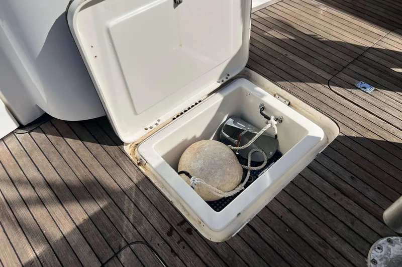 Slide: The Image of Open engine compartment of a 2007 Henriques 42 Express boat, showing internal components. - 15