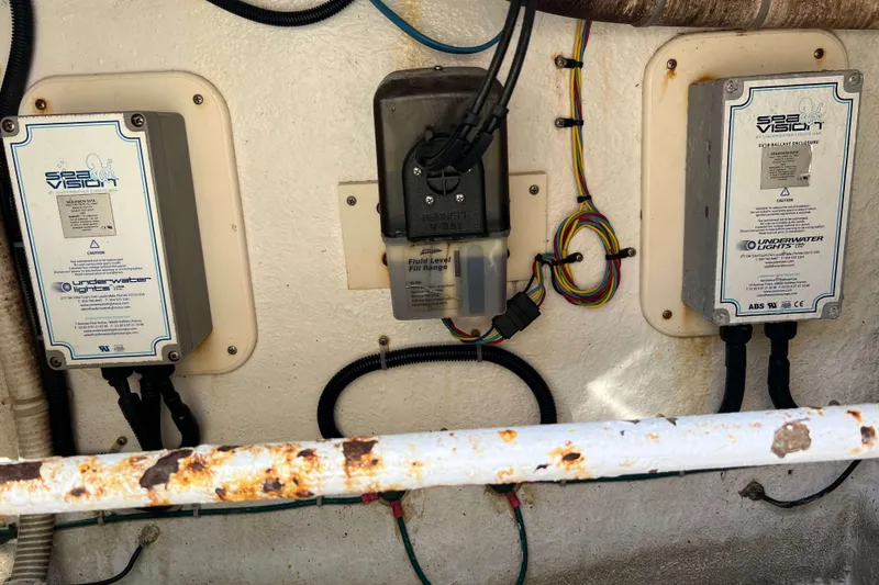 Slide: The Image of 2007 Henriques 42 Express boat deck with white storage compartment. - 19