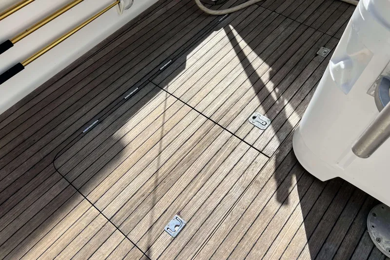 Slide: The Image of Open storage compartment on 2007 Henriques 42 Express boat, featuring a clean interior. - 23