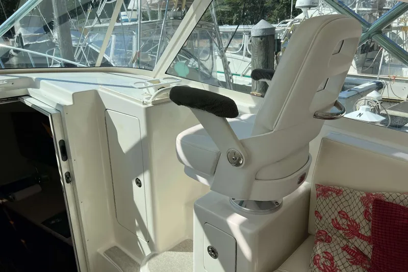 Slide: The Image of Interior view of 2007 Henriques 42 Express yacht cockpit with navigation equipment. - 30