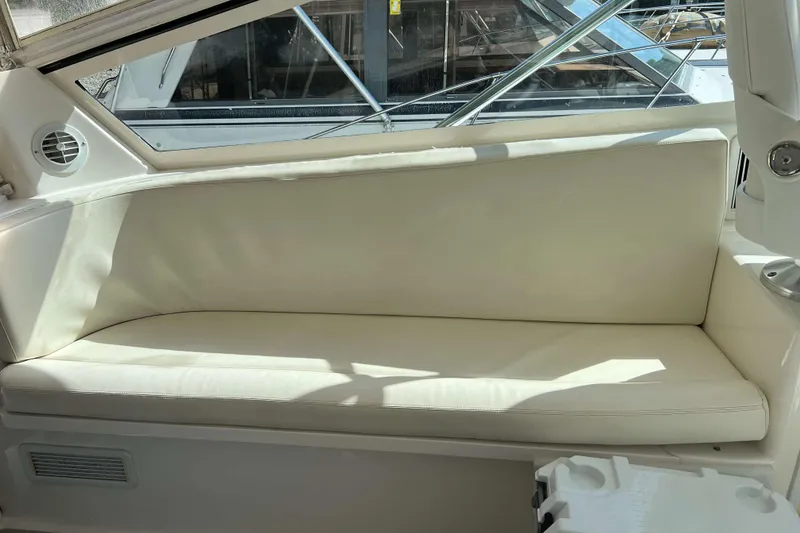 Slide: The Image of Interior of a 2007 Henriques 42 Express boat with helm station and captain's chair. - 32