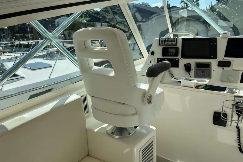 Slide: The Image of Helm of 2007 Henriques 42 Express boat with advanced navigation equipment and controls. - 33