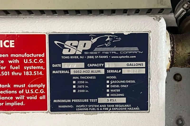 Slide: The Image of MAN Marine Diesel engine in a 2007 Henriques 42 Express boat. - 58