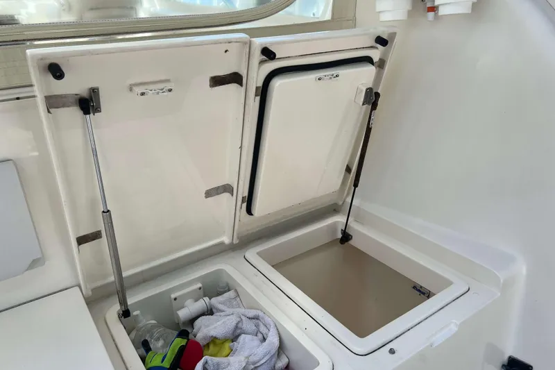 Slide: The Image of Interior view of a 2007 Henriques 42 Express boat with a Tru-Sail label. - 6