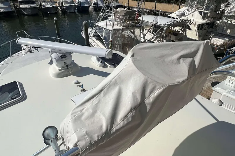 Slide: The Image of 2007 Henriques 42 Express helm with steering wheel and navigation controls. - 71