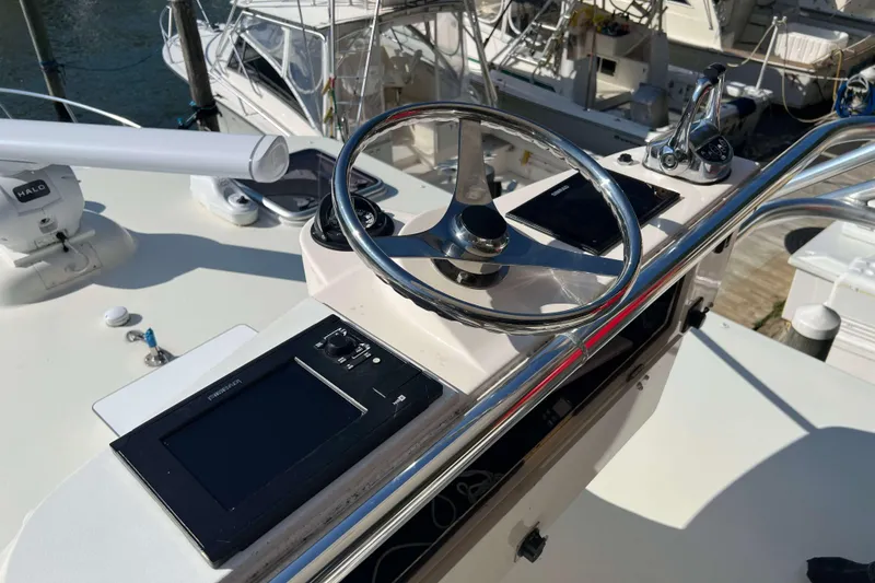 Slide: The Image of Control panel of 2007 Henriques 42 Express with Simrad navigation display. - 72