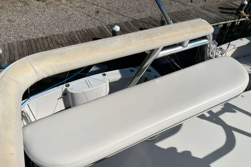 Slide: The Image of 2007 Henriques 42 Express boat docked under clear blue sky. - 76