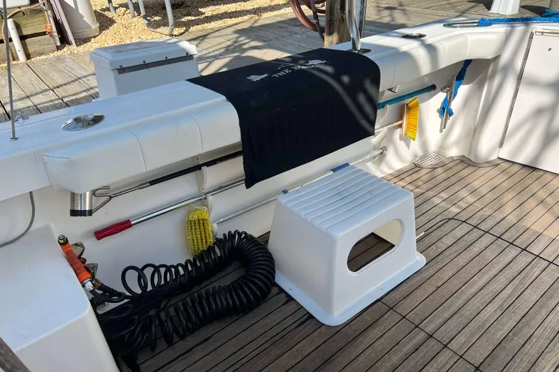 Slide: The Image of 2007 Henriques 42 Express boat interior detail with storage compartment and light fixture. - 8