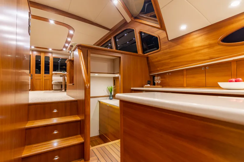 Slide: The Image of Luxurious interior of 2021 Palm Beach Motor Yachts PB65 with elegant wood finish. - 3