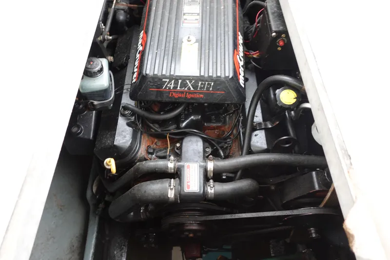 Slide: The Image of Engine of 1997 Sea Ray 270 Sundancer boat, featuring 7.4L LX EFI digital ignition. - 21